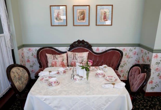 Elegant tea salon set for intimate gatherings and upscale events in charming venue.