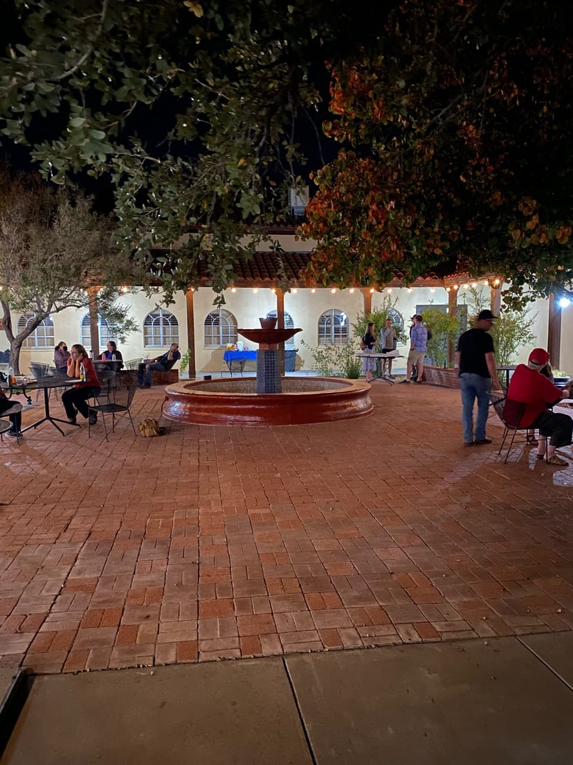 Courtyard at St. Francis Episcopal Church with charming fountain, perfect for outdoor events.