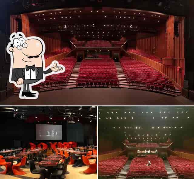 Versatile event space with tiered seating for conferences at Maison de la Danse.