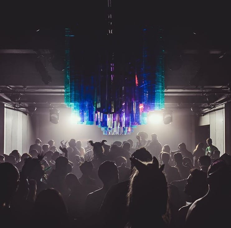 Vibrant concert venue with dynamic lighting, perfect for corporate events and celebrations.