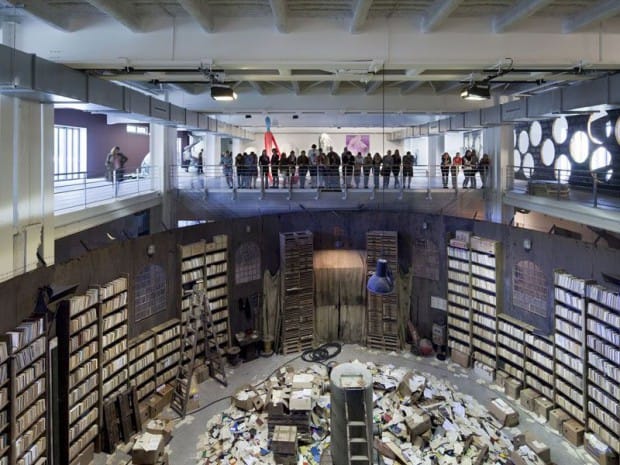 Espace 1960 venue with circular bookshelves, ideal for literary events and workshops.