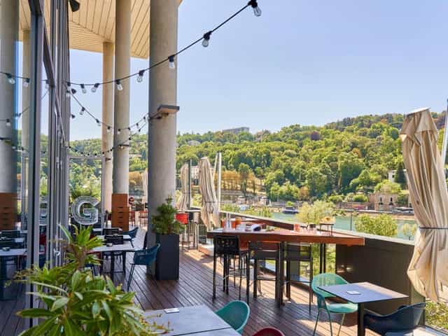 Outdoor event venue at Novotel Lyon, featuring a scenic terrace for meetings and gatherings.