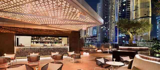 Sophisticated rooftop bar at Hotel Indigo Dubai for networking and cocktail events.
