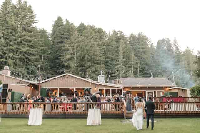 Lodge at The Mountain Terrace outdoor wedding venue with elegant cocktail tables and greenery.
