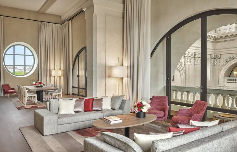 Elegant meeting suites in InterContinental Lyon with arched windows for corporate events.