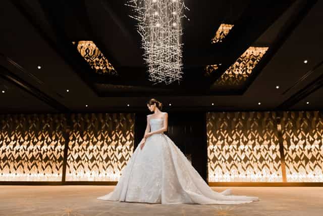 Elegant bridal gown in L'Obelisque Ballroom, luxury venue perfect for upscale weddings.