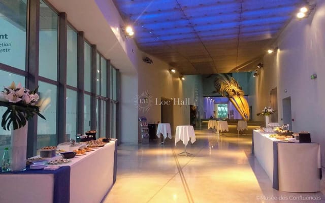 Modern event space in Musée des Confluences, perfect for corporate receptions and gatherings.