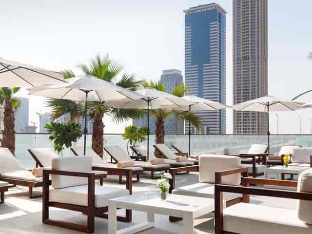 Outdoor lounge in Park Regis Business Bay, perfect for networking events and informal meetings.