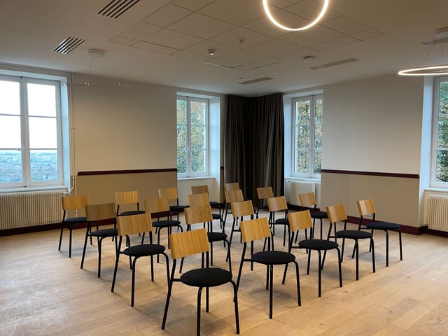 Conference room in Carré Fourvière, bright and inviting for workshops and meetings.