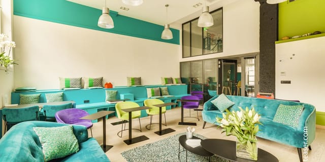Creative Painting Workshop in vibrant, colorful event space for networking and collaboration.