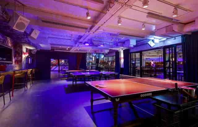 Vibrant event space with ping pong tables for team-building and social mixers in Shoreditch.