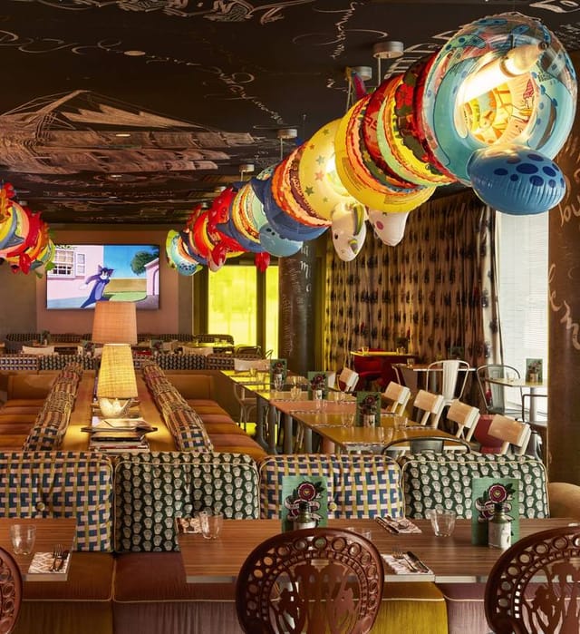 Vibrant Mama Shelter Lyon terrace, perfect for casual gatherings and corporate events. 