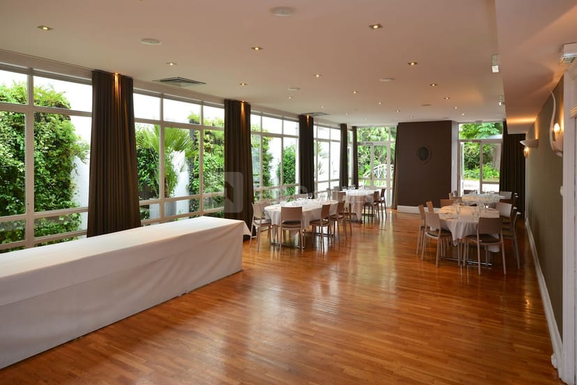 Salle Noble Jehan Catherin event space with wood floor, perfect for corporate meetings or weddings.