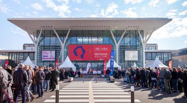 Eurexpo Lyon entrance with welcome banner for a busy trade show event.