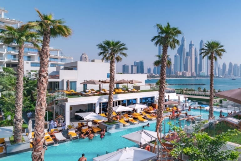 Vibrant poolside venue at FIVE Palm Jumeirah Dubai, ideal for upscale events and gatherings.