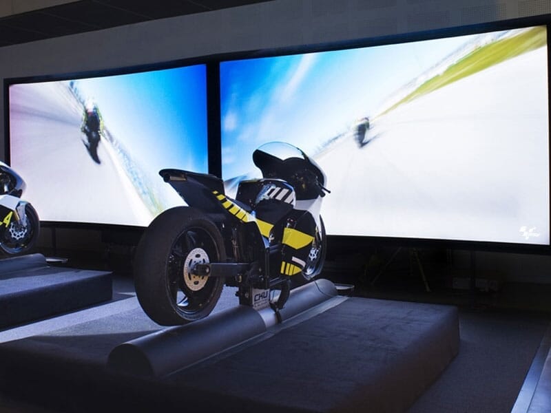 Simulation Moto GP event with sleek motorcycles and high-speed visuals, perfect for motorsport fans.