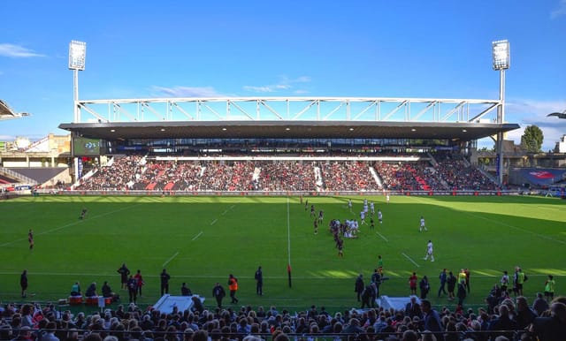 Matmut Stadium in Lyon, vibrant crowd, ideal for corporate events and hospitality packages.