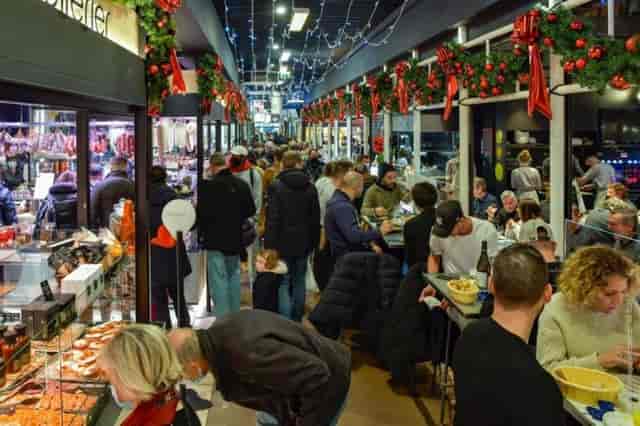 Food court at Halles de Lyon Paul Bocuse, vibrant market for culinary events and gatherings.