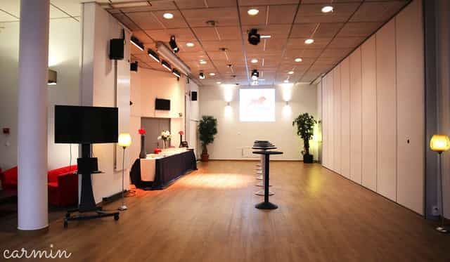 Espace Alizé: modern event space with natural light for meetings and conferences.
