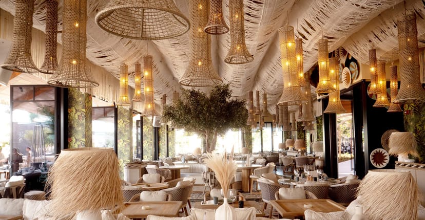 Elegant reception space in Opulence Events Dubai with woven light fixtures, ideal for upscale gatherings.