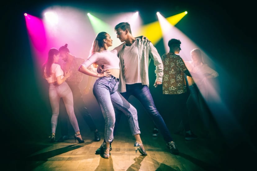 Dynamic dance floor scene with colorful lighting for themed parties and events.