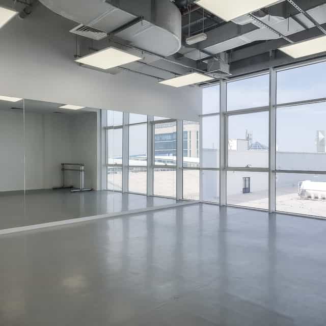 Spacious Dance Studio with Natural Light for Workshops and Events