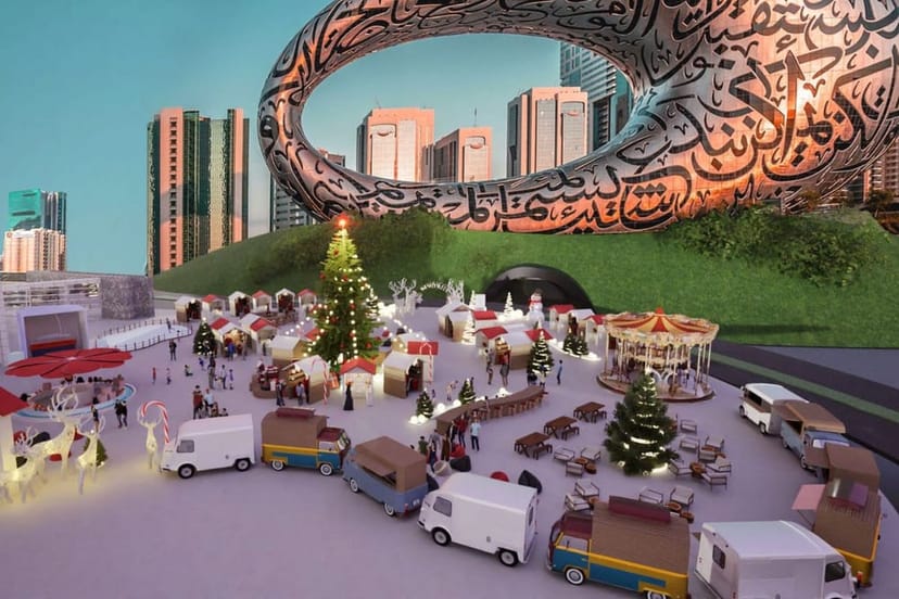 Winter Garden at Jumeirah Emirates Towers: festive outdoor market with modern skyline.