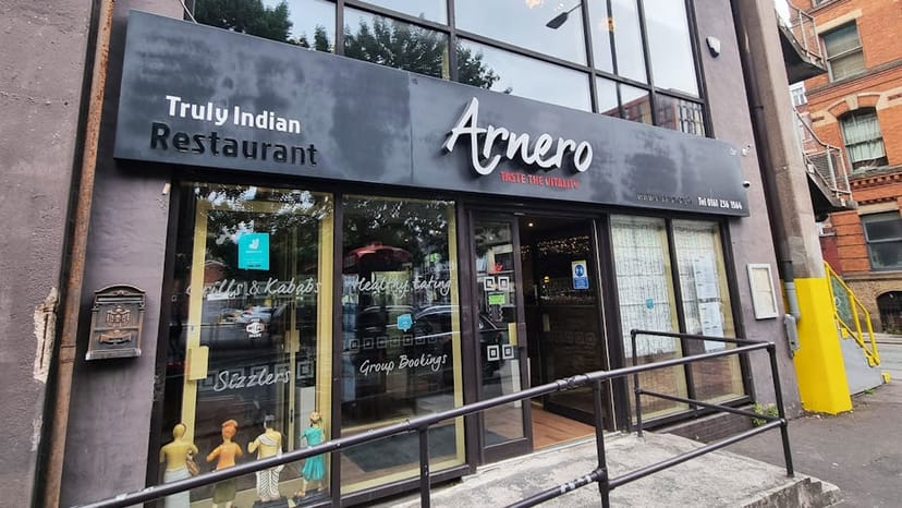 Exterior of Arnero Indian Restaurant with inviting facade for group events and gatherings.