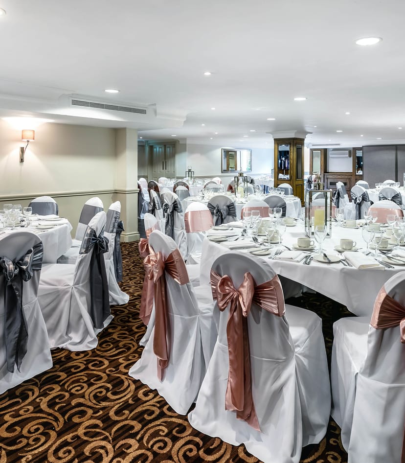 Tatton Suite banquet room with elegant decor, perfect for weddings and corporate events.
