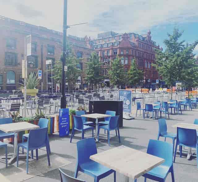 BBQ area in Quarter House with vibrant seating for summer gatherings and networking events.