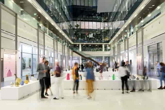 Atriums in Dubai Design District, modern event space with art installation for exhibitions.