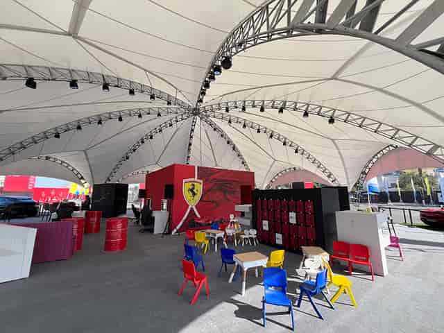 Modern event tent ARCH OCTA 24x26 for luxury automotive product launches.