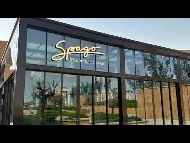 Modern Spago restaurant in VIA Riyadh with glass walls, perfect for upscale events and meetings.
