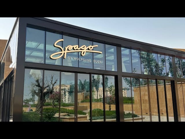 Modern Spago restaurant in VIA Riyadh with glass walls, perfect for upscale events and meetings.