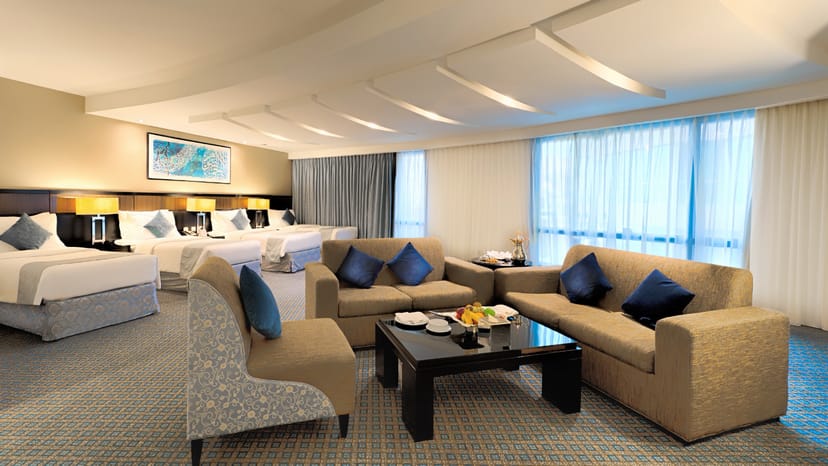 Sophisticated hotel suite with modern furnishings for meetings and gatherings.
