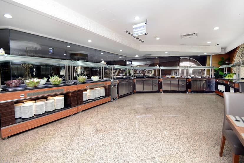 Catering space in Rehab Al Nour Hotel, Medina, ideal for events with buffet setup.