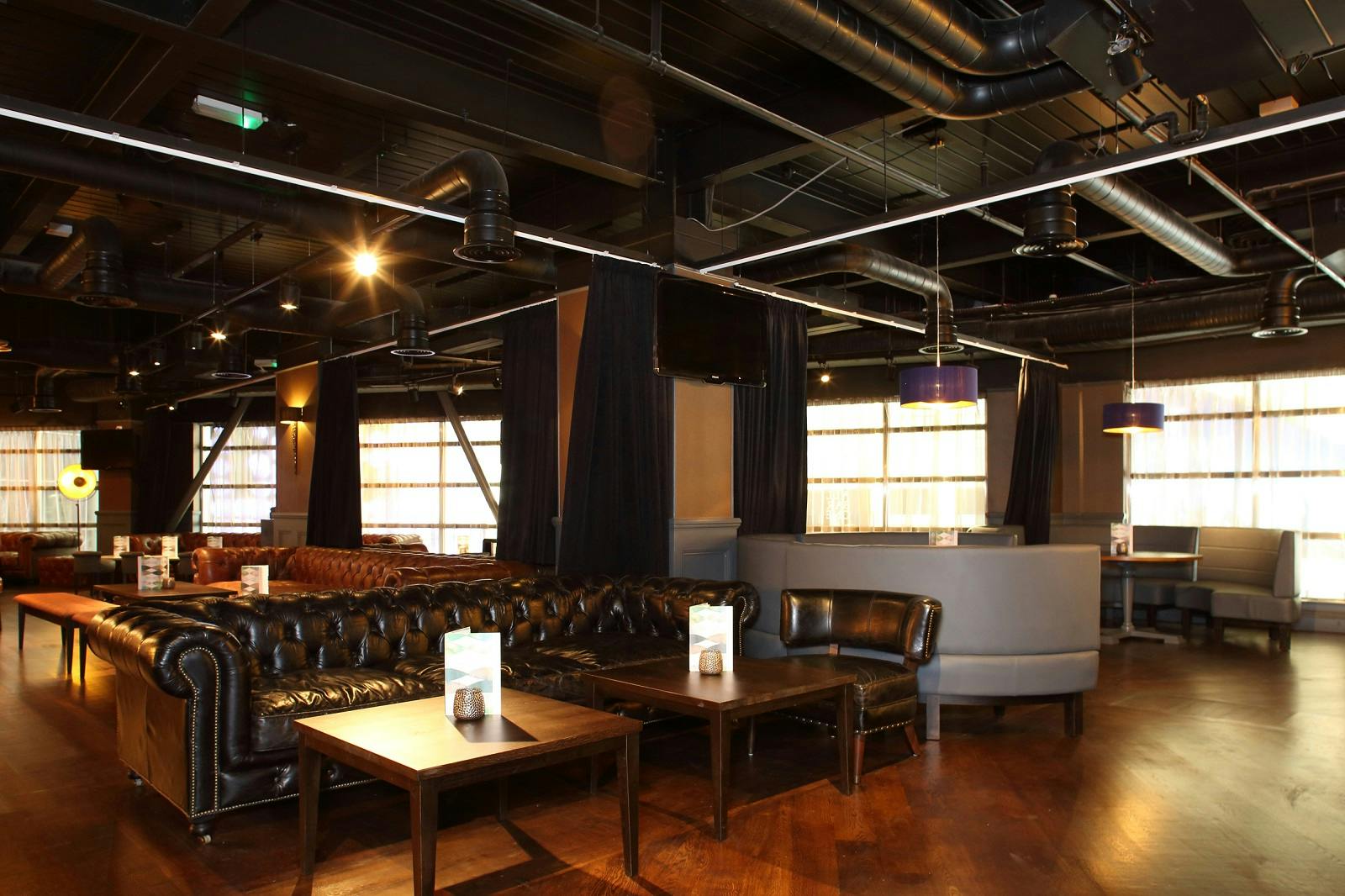 ABO Lounge at All Bar One - The O2, modern event space with stylish seating for gatherings.