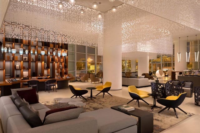 Modern lobby in Le Meridien Riyadh, perfect for casual meetings and networking events.