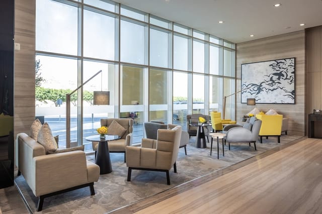 Modern shared lounge in Citadines Abha, ideal for networking and casual meetings.
