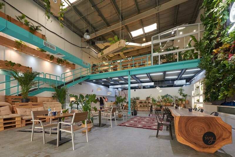 Art cafe in Ivy's Secret Garden with modern decor, perfect for meetings and events.