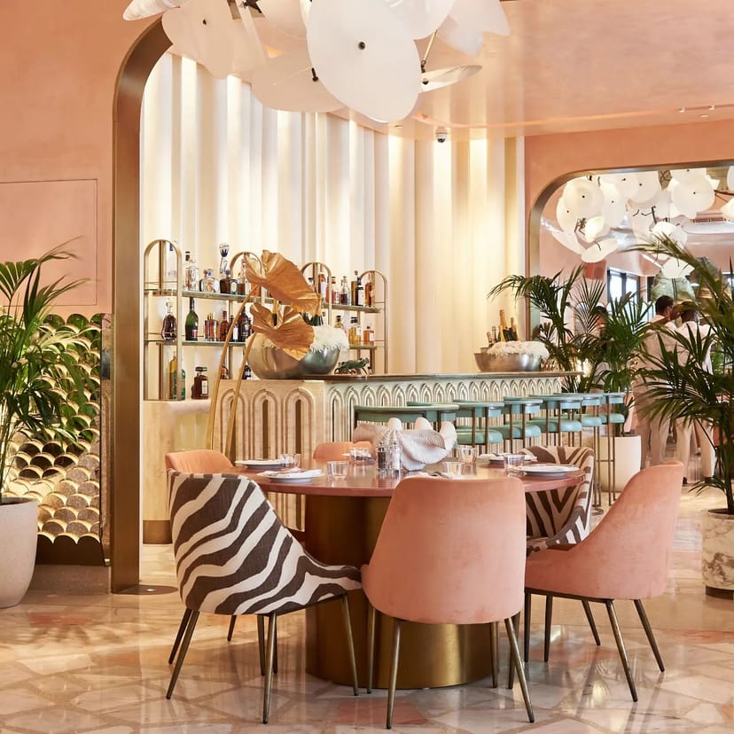 Elegant restaurant interior for upscale meetings and events with modern furnishings.
