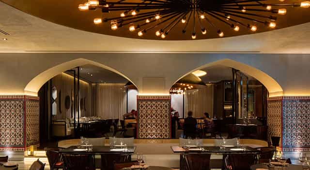 Stylish Rüya Dubai restaurant with arched architecture, perfect for intimate dining events.
