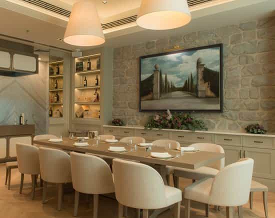 Private dining room at Il Borro Tuscan Bistro, stylish decor ideal for corporate events.