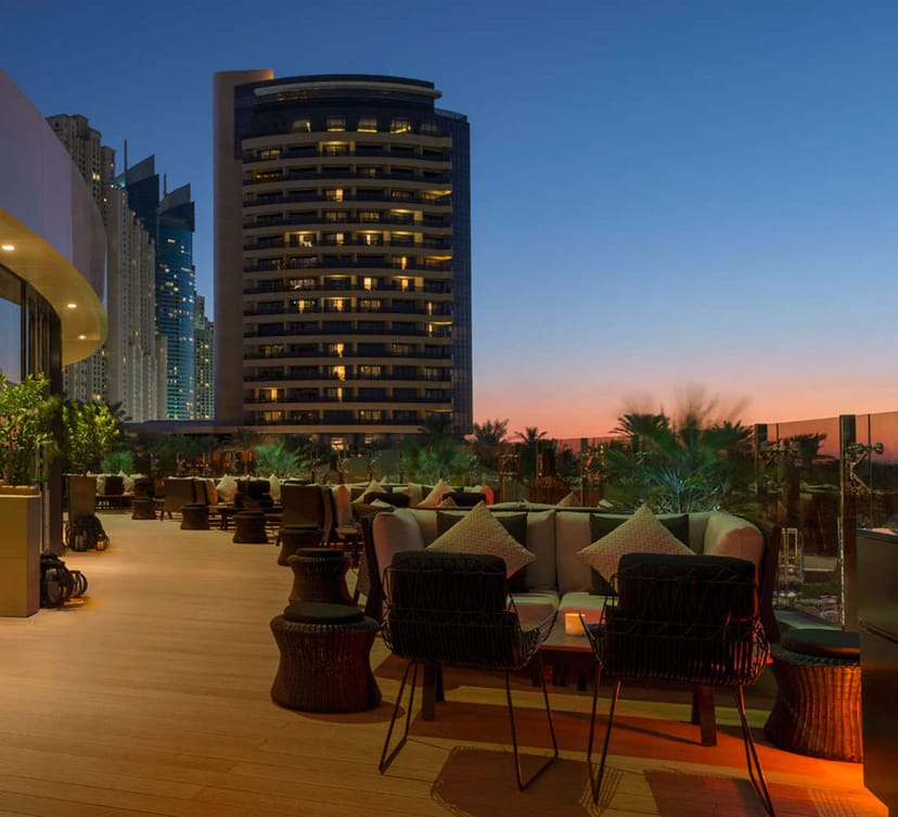 Sophisticated Zengo rooftop bar with skyline view, ideal for cocktail parties and networking.