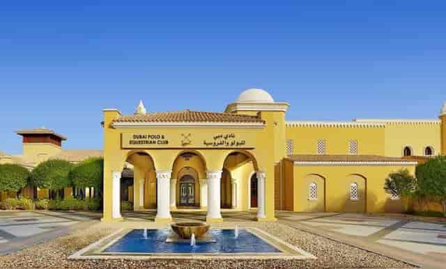 Outdoor birthday venue at Dubai Polo & Equestrian Club with elegant architecture.