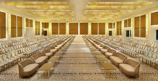 Sophisticated banquet hall in Hilton Riyadh for events, featuring elegant décor and natural light