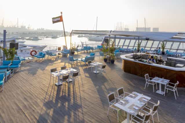 Yacht Club deck on Queen Elizabeth 2, stylish bar, ideal for events and meetings.