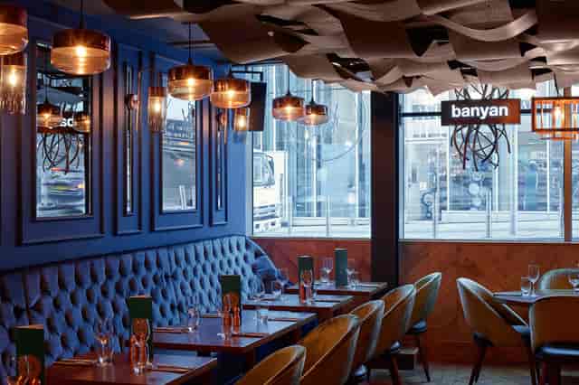 Stylish Banyan Bar & Kitchen interior, perfect for corporate events and gatherings.