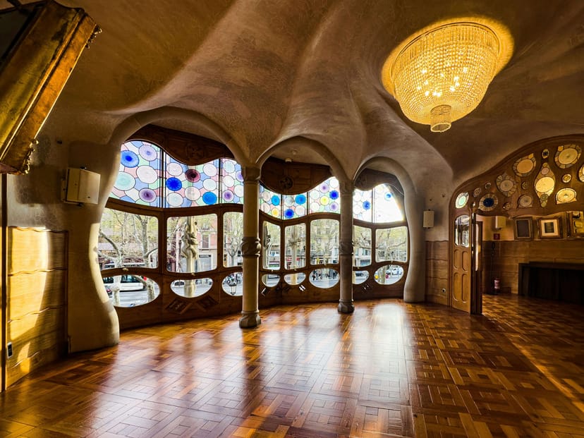 Studio in Signature Breeze with vibrant stained glass for intimate gatherings and events.