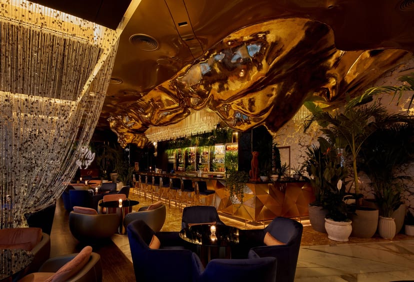 Luxurious Gilt bar at Jumeirah Burj Al Arab, ideal for upscale corporate events.